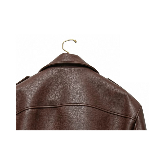 Brown leather jacket on a hanger against a white background