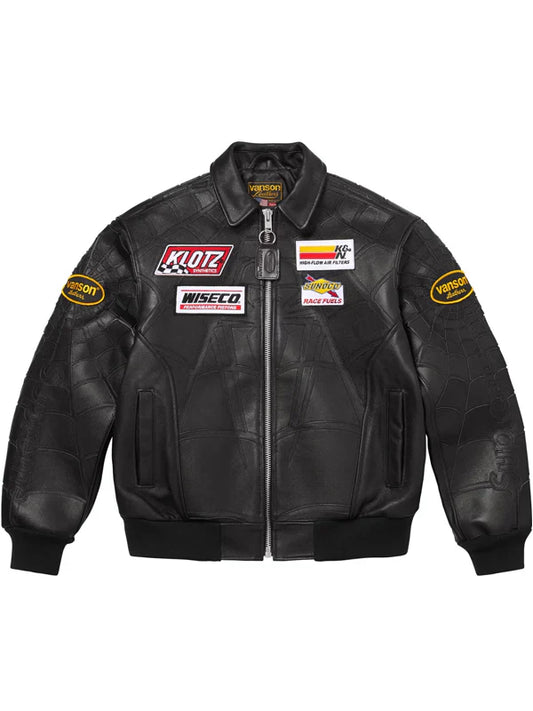 black leather biker jacket styled with denim and boots