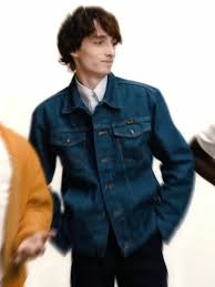 Stranger Things character cosplay outfits including red denim jacket and leather accents.