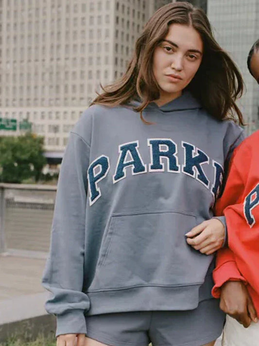 oversized hoodie streetwear look inspired by 80s fashion