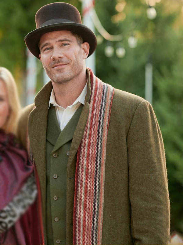 “Ryan Scott Wool Coat from A Magical Christmas Village – Mid-length winter coat with structured shoulders, cozy wool, and festive holiday style”