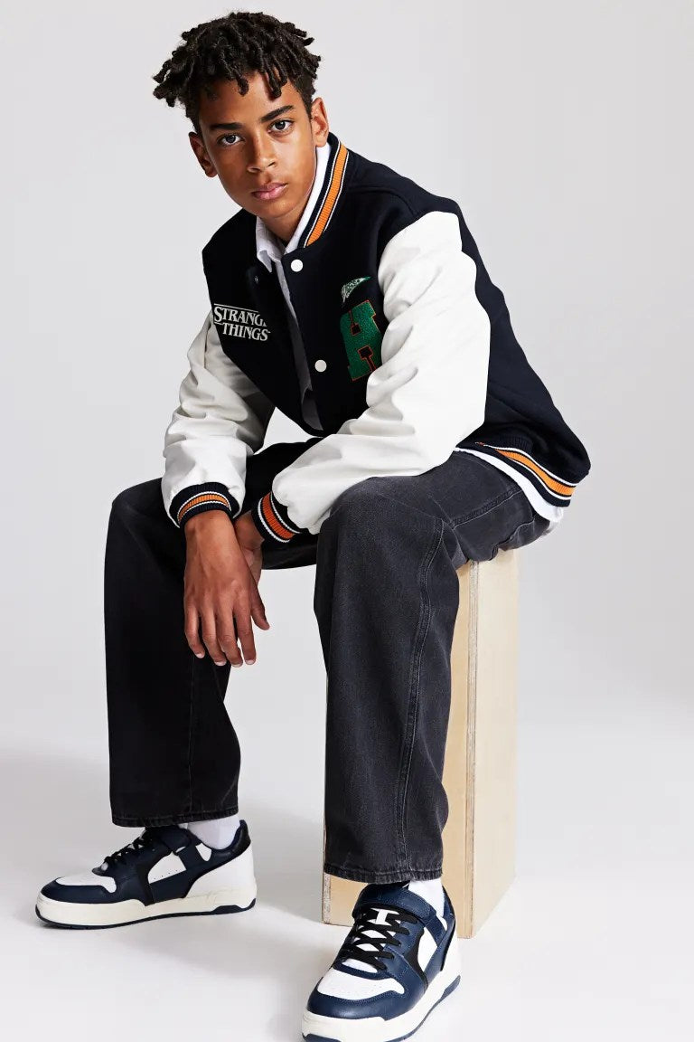 Stranger Things Varsity Jacket, black wool with leather sleeves, baseball style