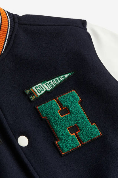 Stranger Things Varsity Jacket, black wool with leather sleeves, baseball style