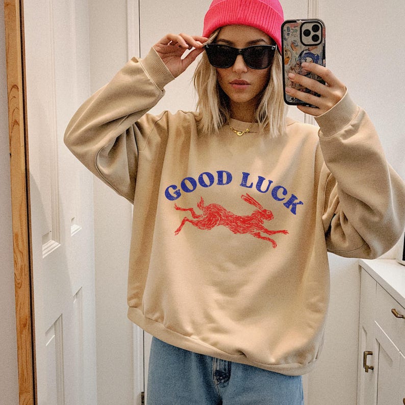 Good luck sweathirt. Lucky Rabbit sweater. Easy Tiger. Cool women's sweatshirt. Aesthetic sweaters. Cool girl sweaters. Retro western style.
